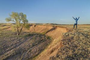 prairie in northern Colorado with a lonely male figure photo