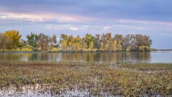 fall sunset scenery in Boyd Lake State Park in Loveland, Colorado photo
