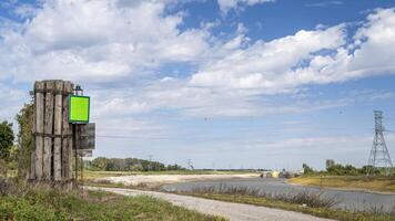 navigational marker and Granite City Lock and Dam - Chain of Rocks Bypass Canal of Mississippi River photo