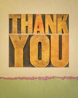 thank you, word abstract in vintage letterpress wood type on art paper, vertical poster photo