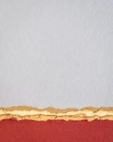 abstract paper landscape gray and red and pastel tones - collection of handmade rag papers photo