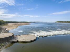 Low Water Dam with interlocking sheet piling, a rapid and fisihing beach on the Mississippi RIver below Chain of Rocks photo