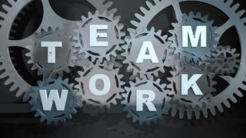 Group of metallic gears rotating with the letters TEAMWORK in white against a black background. Loop sequence. 3D Animation video