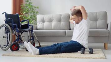 Disabled sportsman doing stretching and exercises on wheelchair background. Concept of inclusion and disability video