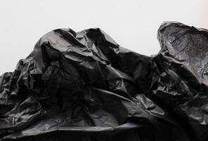 Pattern Of Black Crumpled Packaging Material Textured Effect Stock Photo