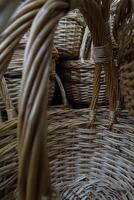 Braided handles of wicker baskets closeup view photo