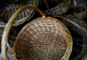 Woven reed baskets with wicker handles top view stock photo