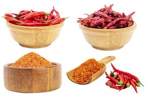 Cayenne pepper with red chilies, paprika powder in a wooden bowl, and spicy condiments Isolated on a white background - clipping path photo