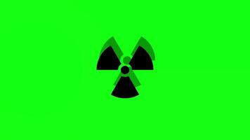 Animation of a black radiation sign symbol on a green background, pulsating from the center of the picture to the viewer video