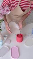 young woman making gypsum artisanal items video