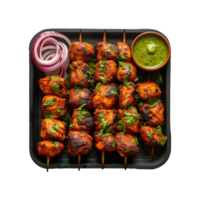 Chicken tikka kebabs with chutney on transparent background png