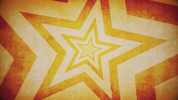 Trendy retro grunge background with repeating star shapes pattern. This textured vintage background animation is full HD and looping. video