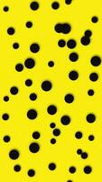 Vertical - trendy abstract motion background animation with gently moving black dots on a yellow grid pattern. This modern stylish background is full HD and a seamless loop. video