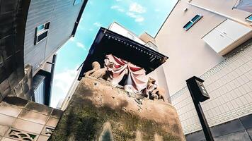 Small shrine and fox, Shimotakaido, Tanaka Inari Daimyojin,, 3-chome Shimotakaido, Suginami-ku, Tokyo, Japan The date of its establishment is unknown, but it is said to have been enshrined there duri photo