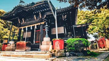 wooden worship hall Mimeguri Shrine,Mimeguri Shrine is a shrine located in Mukojima, Sumida Ward, Tokyo, Japan. photo