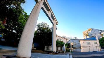 Otorii and approach to the shrine.Oji Shrine is a shrine located in Oji Honmachi, Kita Ward, Tokyo, Japan. photo