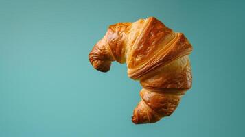 AI generated Croissant floating in the air, solid background. Generated by artificial intelligence. photo