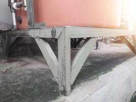 Iron frame stand for water tank storage. photo