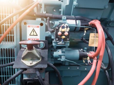 Installation circuit component of double starting motor on the heavy engine generator. Circuit component of Starting system, double starting motor. photo