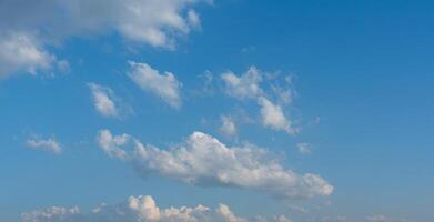 Cloudscape - Blue sky and white clouds background. photo