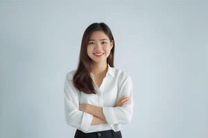 Business woman wearing white t shirt smiling, young happy Asia woman looks in camera photo