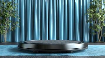 a robot vacuum cleaner on a blue rug in front of a curtain photo