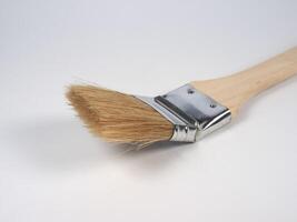 paintbrush on desk with copy space photo