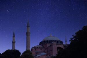 Hagia Sophia mosque with a moon in the background. Happy the 27th day of Ramadan or laylat al-qadr. photo