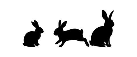 Silhouettes of easter bunnies isolated on a white background. Set of different rabbits silhouettes vector