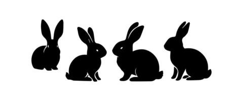 Silhouettes of easter bunnies isolated on a white background. Set of different rabbits silhouettes vector