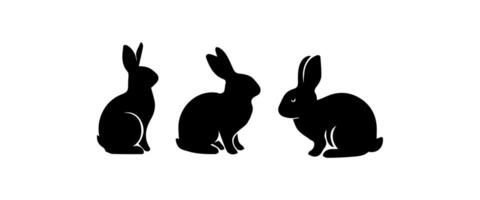 Silhouettes of easter bunnies isolated on a white background. Set of different rabbits silhouettes vector