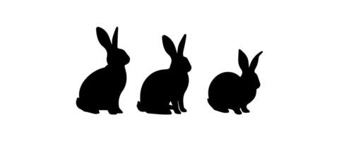 Silhouettes of easter bunnies isolated on a white background. Set of different rabbits silhouettes vector