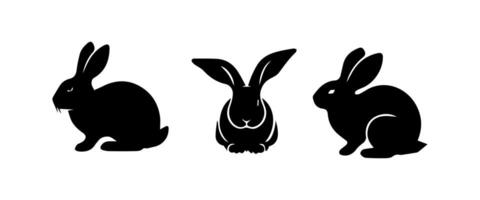 Silhouettes of easter bunnies isolated on a white background. Set of different rabbits silhouettes vector