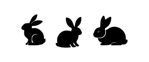 Silhouettes of easter bunnies isolated on a white background. Set of different rabbits silhouettes vector