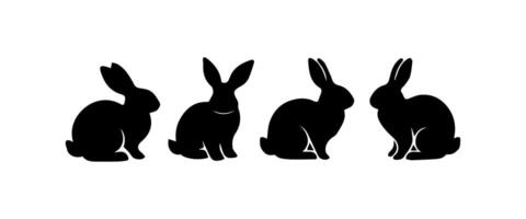 Silhouettes of easter bunnies isolated on a white background. Set of different rabbits silhouettes vector