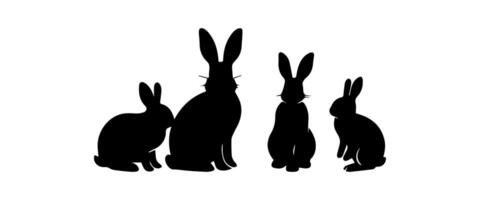 Silhouettes of easter bunnies isolated on a white background. Set of different rabbits silhouettes vector