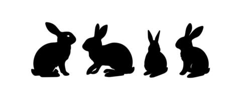 Silhouettes of easter bunnies isolated on a white background. Set of different rabbits silhouettes vector