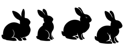 Silhouettes of easter bunnies isolated on a white background. Set of different rabbits silhouettes vector