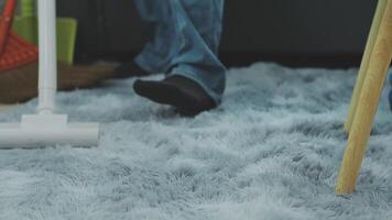 Woman cleaning table using rag and diffuser at home. video