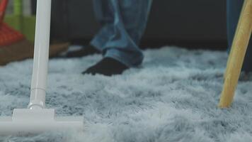 Woman cleaning table using rag and diffuser at home. video