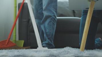 Woman cleaning table using rag and diffuser at home. video