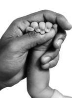 Father holding hands of newborn son on Father's Day png