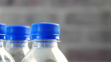 plastic bottles of soft drink on table video