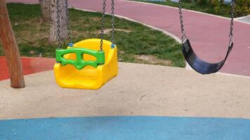 Close-up of a baby swing in the playground video