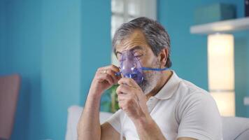 Man with shortness of breath wears respirator. video