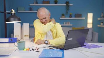 Home office worker man has shoulder pain. video