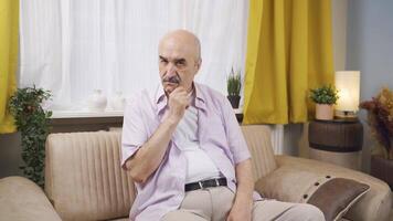 Man looking thoughtfully at camera. video