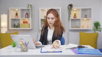 Home office worker woman stressed and thoughtful. video