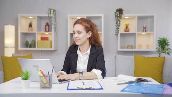 Home office worker woman looking with satisfied expression. video