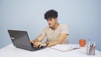 Man closing laptop with angry expression. video